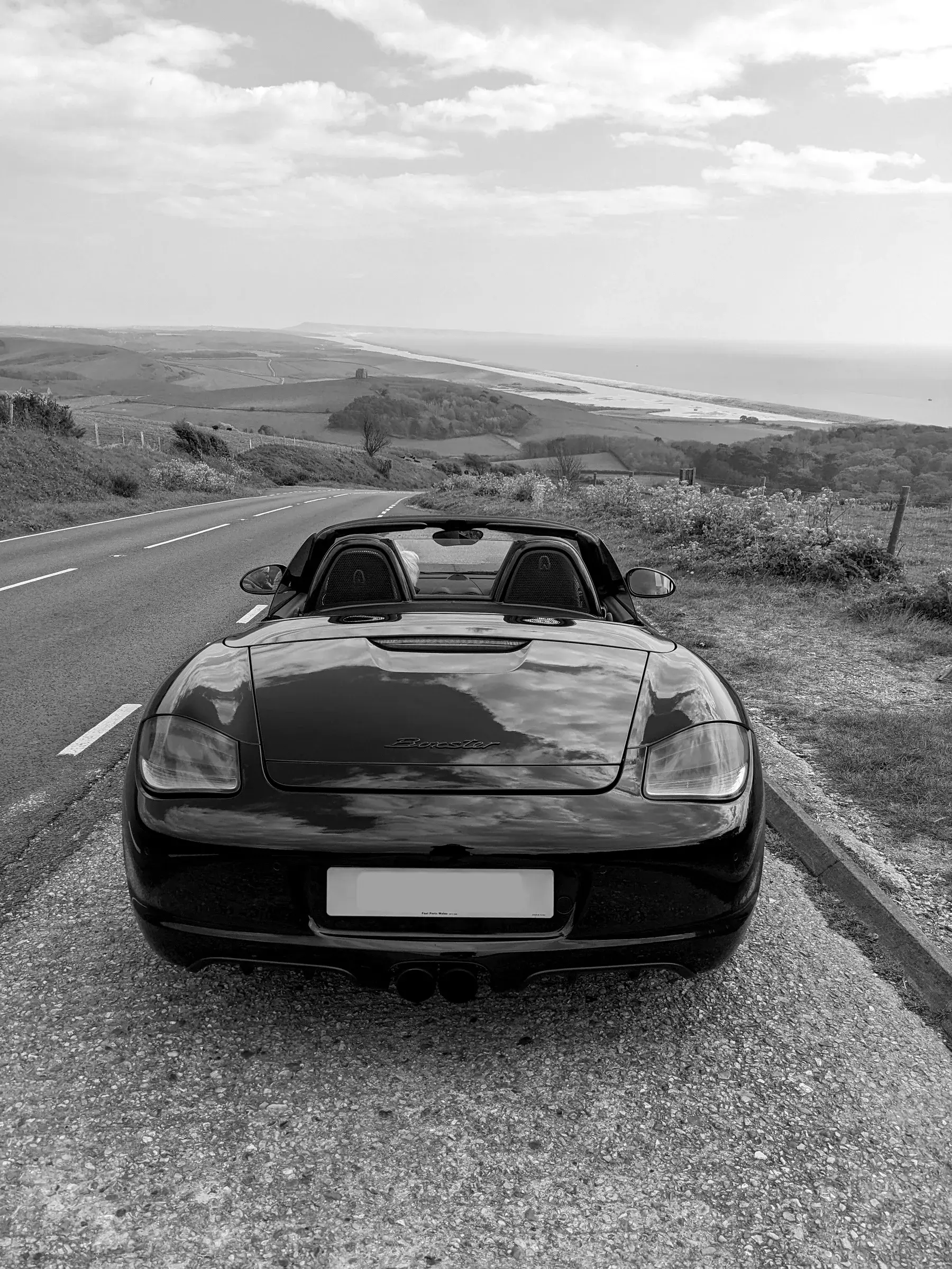 A Boxster on the coast road above Abbotsbury